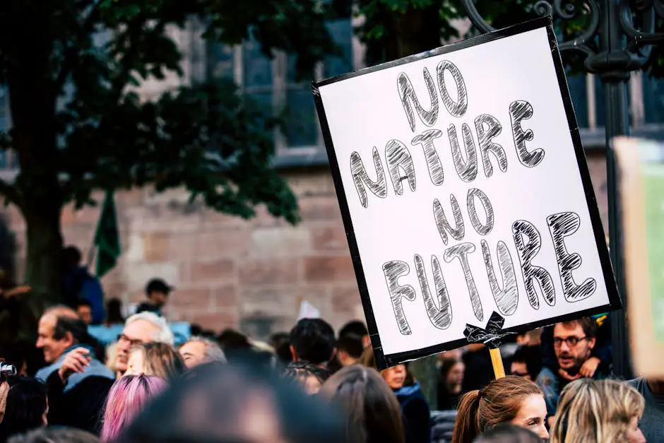 A massive crowd of people, young and old, march together in a global climate protest, holding signs and banners with environmental messages. The sea of protesters stretches as far as the eye can see, a testament to the worldwide support for Greta Thunberg's call to action against the climate crisis.