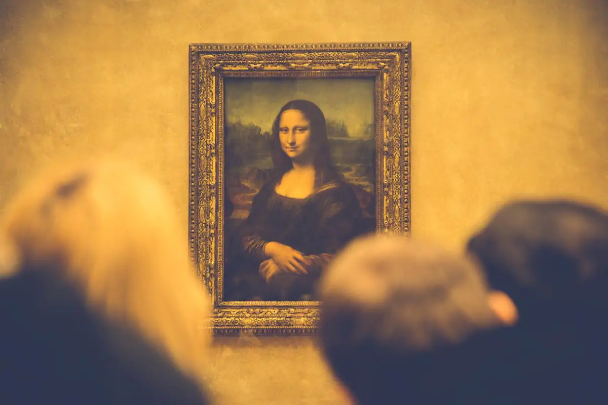 A portrait of a woman with a mysterious smile, known as the Mona Lisa, painted by Leonardo da Vinci. The painting is smaller than many people think, measuring only 77 cm in height and 53 cm in width. It is devoid of visible eyebrows and eyelashes, which were originally painted by da Vinci but have worn off over time. The exact date when the painting was started is unknown, but historians believe da Vinci began working on it around 1503 and may have never considered it finished. The Mona Lisa represents da Vinci's mastery of painting technique and philosophy, with every detail contributing to the fascination and enigma of this unparalleled composition.